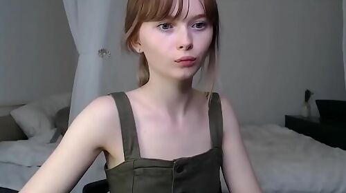 Cute innocent teen teasing in webcam